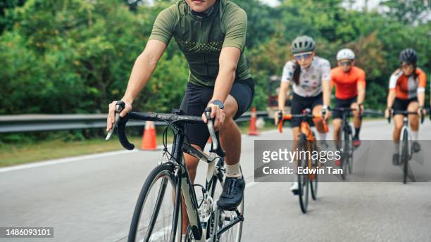 group of asian chinese cyclist cycling in rural scene - pursuit sports competition format stock pictures, royalty-free photos & images