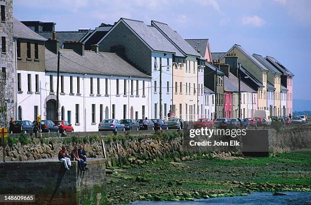 waterfront houses along galway bay. - galway stockfoto's en -beelden