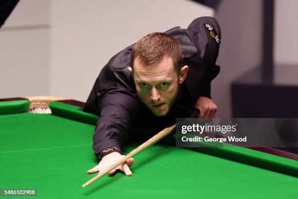 Mark Allen of Northern Ireland plays a shot during their Semi Final match against Mark Selby of England on Day Fourteen of the Cazoo World Snooker...