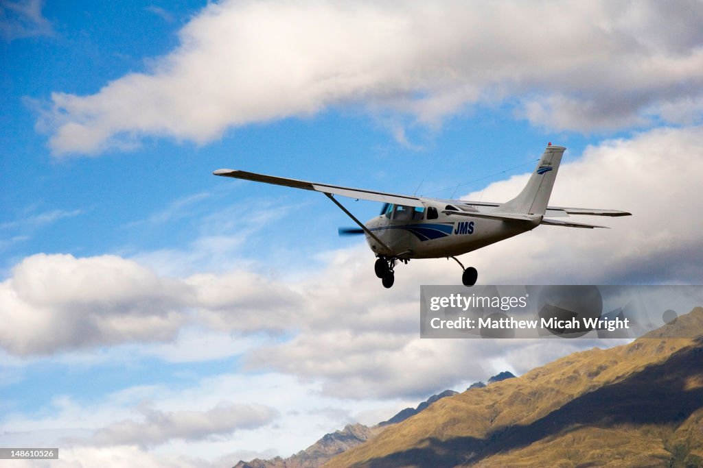Sighteseeing light plane in flight.