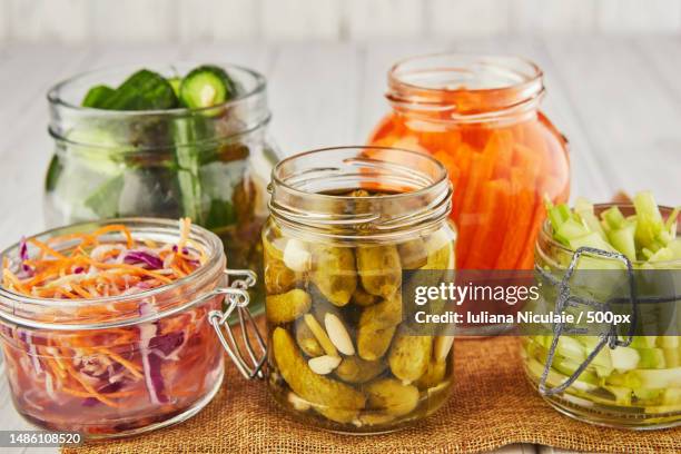 close-up of food in jars on table - gären stock-fotos und bilder