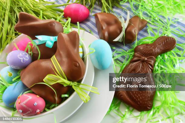 assorted easter bunnies and eggs on kitchen counter,romania - easter basket - fotografias e filmes do acervo