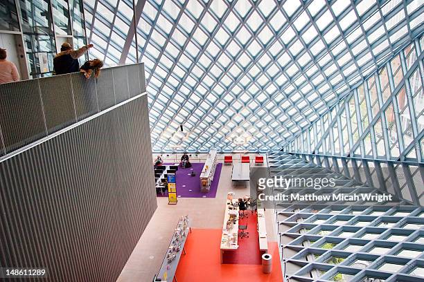central library interior, latticed glass roof. - seattle stock-fotos und bilder
