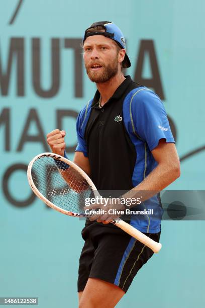 Hugo Grenier of France celebrates winning the first set against Sebastian Korda of United States during the Men's Singles second round match on Day...