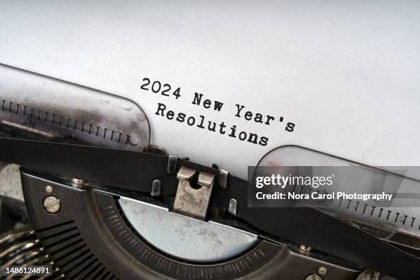 2024 new year's resolutions text on old typewriter - new years resolution stock pictures, royalty-free photos & images