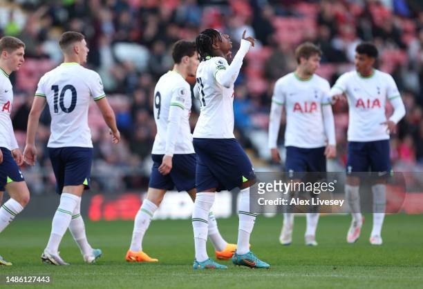 Romaine Mundle of Tottenham Hotspur U21 celebrates after scoring their first goal during the Premier League 2 match between Manchester United U21 and...