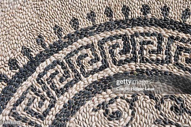 cobblestone mosaic detail. - mosaic greek stock pictures, royalty-free photos & images