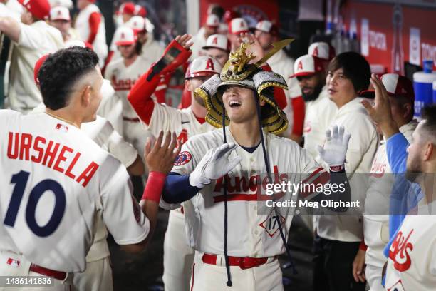 Shohei Ohtani of the Los Angeles Angels celebrates his two run home run in the eighth inning against the Oakland Athletics at Angel Stadium of...