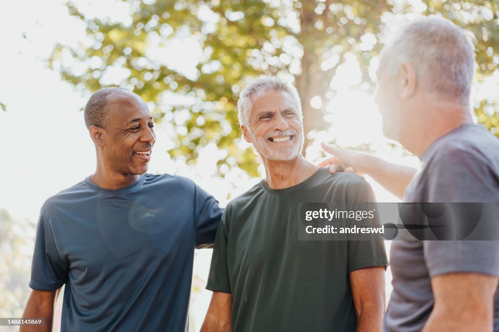 Three friends having fun in the public park