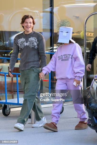 Millie Bobby Brown with boyfriend Jake Bongiovi are seen in Milan on April 28, 2023 in Malpensa airport, Italy.