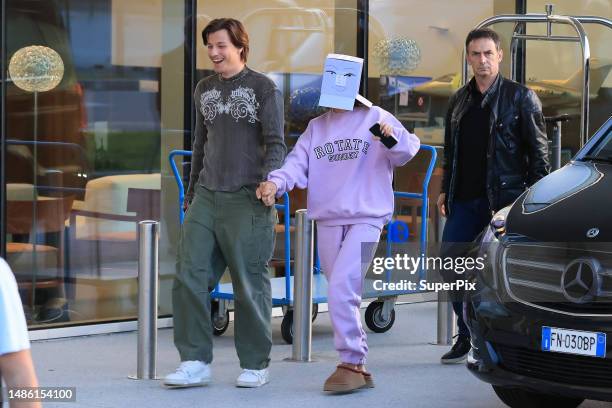 Millie Bobby Brown with boyfriend Jake Bongiovi are seen in Milan on April 28, 2023 in Malpensa airport, Italy.