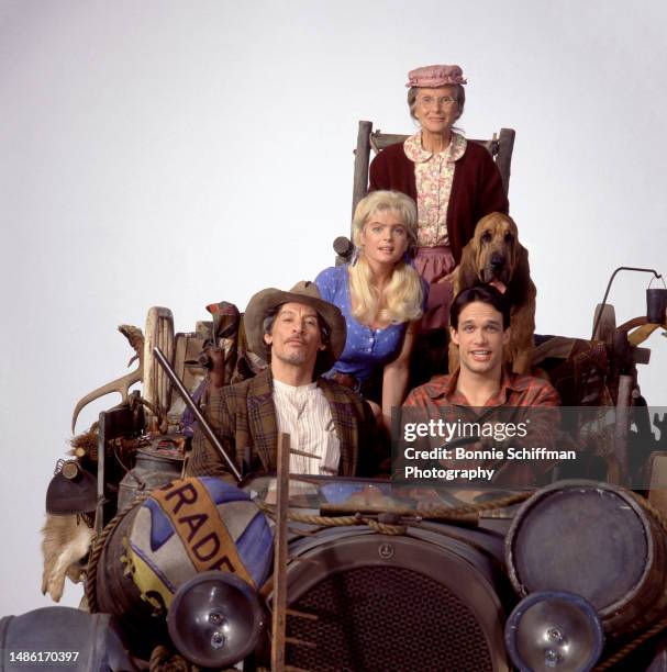 American actor Jim Varney , actress Erika Eleniak, actress Cloris Leachman and actor Diedrich Bader pose in costume for the 1993 comedy film The...