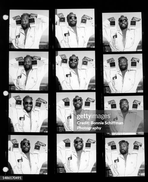 American musician and singer George Clinton poses with speakers and Walkman in these twelve images on one proof sheet in Los Angeles, California,...