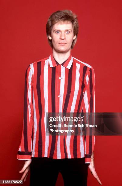 American musician Daryl Hall, of the American pop rock duo Hall and Oates, poses for a portrait in a red, white and black striped shirt in Los...
