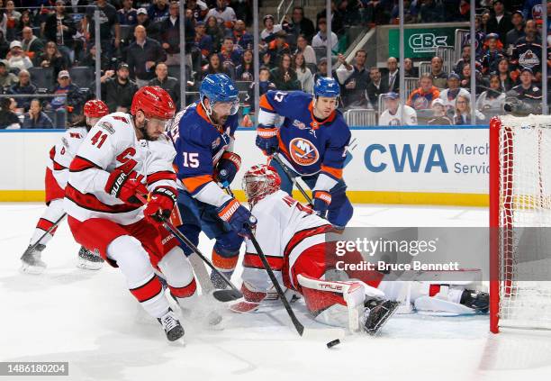 Frederik Andersen of the Carolina Hurricanes makes the second period save on Cal Clutterbuck of the New York Islanders in Game Six of the First Round...