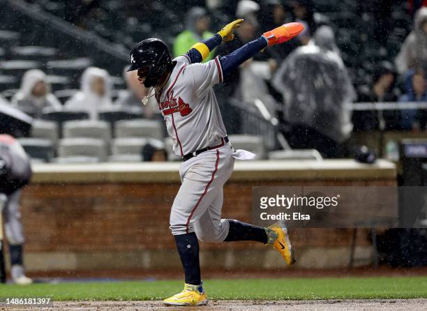 Ronald Acuna Jr. #13 of the Atlanta Braves scores off a three run home run from teammate Matt Olson in the fifth inning against the New York Mets at...