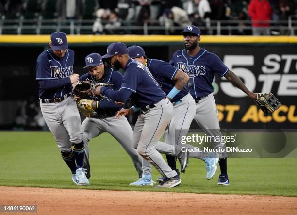 The Tampa Bay Rays celebrate their team win over the Chicago White Sox at Guaranteed Rate Field on April 28, 2023 in Chicago, Illinois. The Rays...