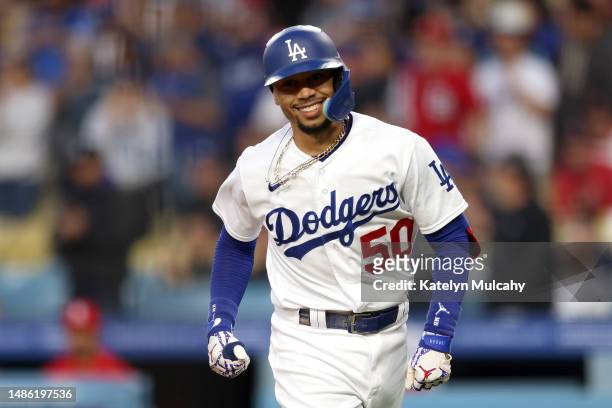 Mookie Betts of the Los Angeles Dodgers celebrates his home run during the first inning of the game against the St. Louis Cardinals at Dodger Stadium...