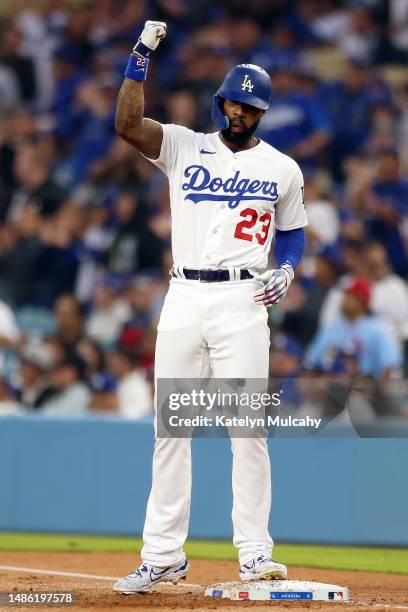 Jason Heyward of the Los Angeles Dodgers reacts after an RBI single during the first inning of the game against the St. Louis Cardinals at Dodger...