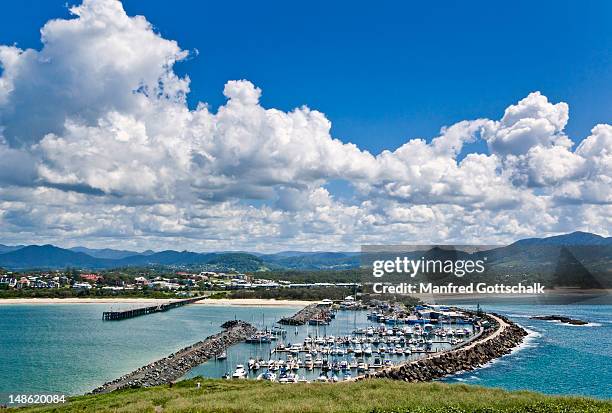 view of the breakwater with marina, and jetty beach. - ports nsw stock pictures, royalty-free photos & images