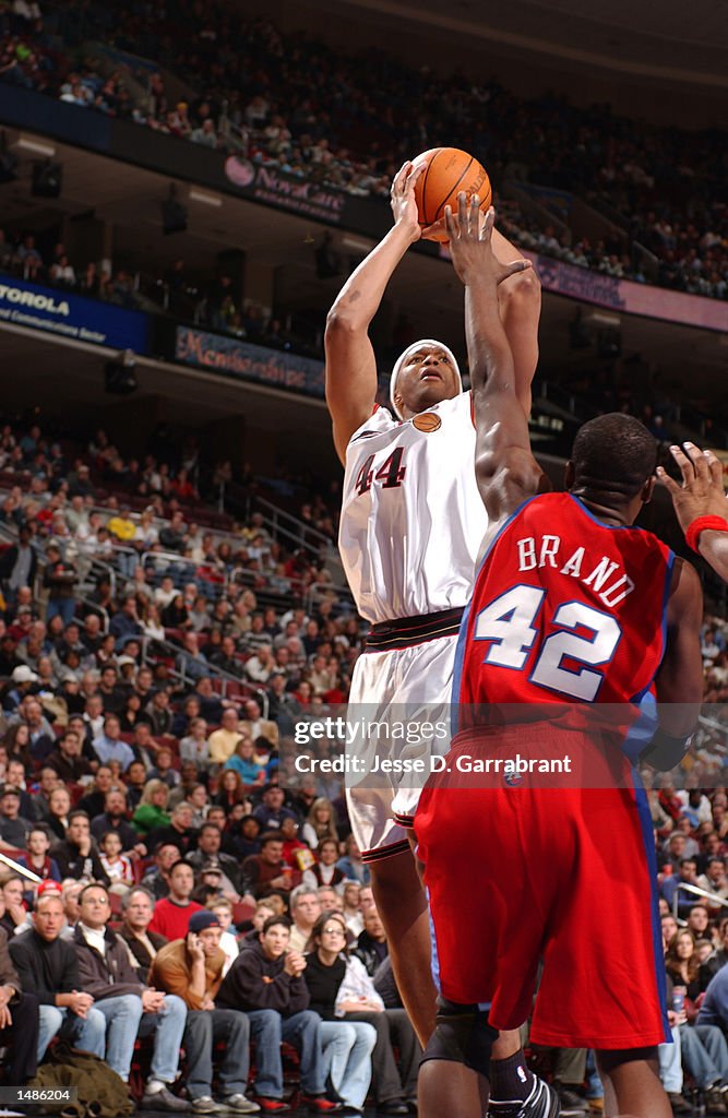 Derrick Coleman #44 of the Philadelphia 76ers shoots over Elton Brand #42 of the Los Angeles Clippers