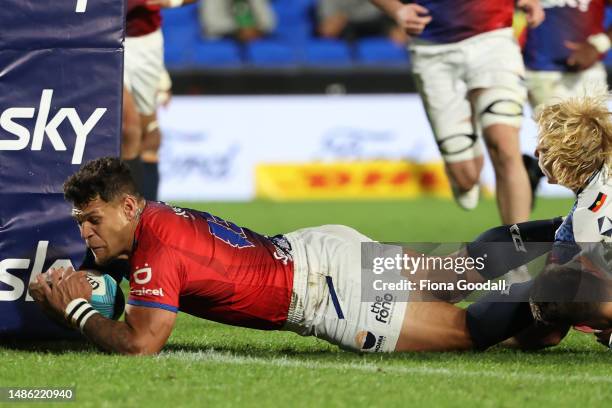 Levi Aumua of Moana Pasifika scores a try during the round 10 Super Rugby Pacific match between Moana Pasifika and Melbourne Rebels at Mt Smart...