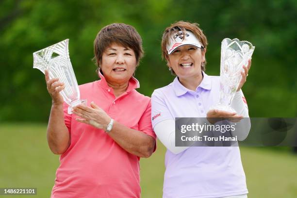 Miyuki Shimabukuro and Hiroko Fukushima of Japan pose with trophies after the final round of the TAIYO-LIFE Legends Cup at Tokyu Seven Hundred Club...