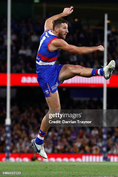 Marcus Bontempelli of the Bulldogs kicks for goal during the round seven AFL match between Western Bulldogs and Hawthorn Hawks at Marvel Stadium, on...