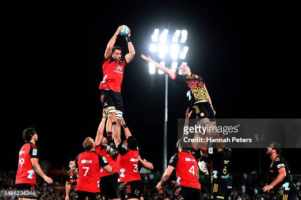 Sam Whitelock of the Crusaders collects the ball from a lineout during the round 10 Super Rugby Pacific match between Chiefs and Crusaders at FMG...