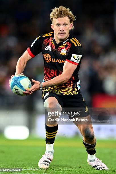 Damian McKenzie of the Chiefs charges forward during the round 10 Super Rugby Pacific match between Chiefs and Crusaders at FMG Stadium Waikato, on...