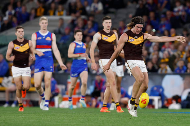 Jai Newcombe of the Hawks kicks a goal during the round seven AFL match between Western Bulldogs and Hawthorn Hawks at Marvel Stadium, on April 29 in...