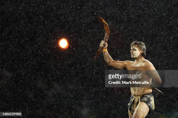 An Indigenous dancer performs before the round nine NRL match between Penrith Panthers and Wests Tigers at Carrington Park on April 29, 2023 in...