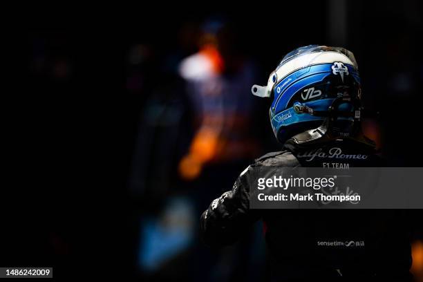 17th placed qualifier Valtteri Bottas of Finland and Alfa Romeo F1 walks in the Pitlane during the Sprint Shootout ahead of the F1 Grand Prix of...