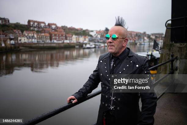 Punky Pete' from Marske by the Sea poses for a picture as he attends during the Whitby Goth Weekend on April 29, 2023 in Whitby, England. The...