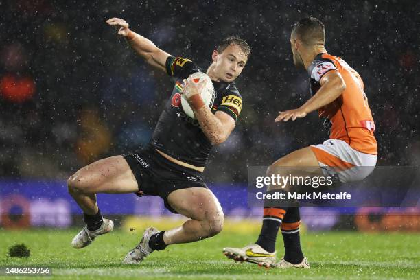 Dylan Edwards of the Panthers looses his footing during the round nine NRL match between Penrith Panthers and Wests Tigers at Carrington Park on...