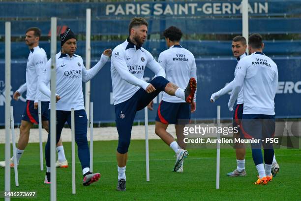 Sergio Ramos and Kylian Mbappe warmup during a Paris Saint-Germain training session on April 29, 2023 in Paris, France.