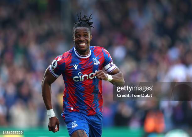 Wilfried Zaha of Crystal Palace celebrates after scoring the team's second goal during the Premier League match between Crystal Palace and West Ham...