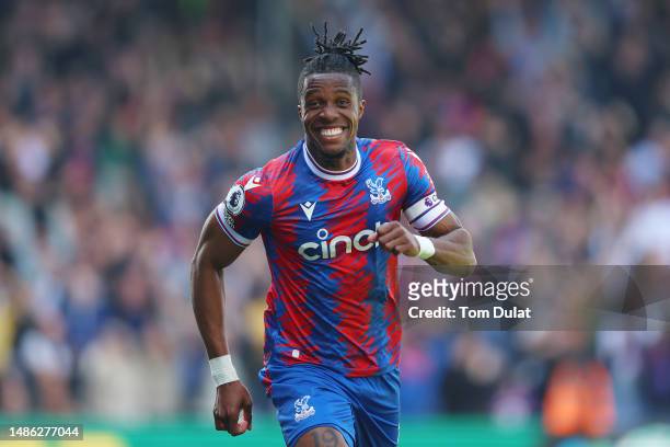 Wilfried Zaha of Crystal Palace celebrates after scoring the team's second goal during the Premier League match between Crystal Palace and West Ham...