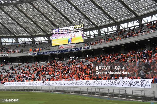 Supporters of Albirex Niigata show messages to J.League. They protest that J.League is considering shifting the season after the J.LEAGUE Meiji...