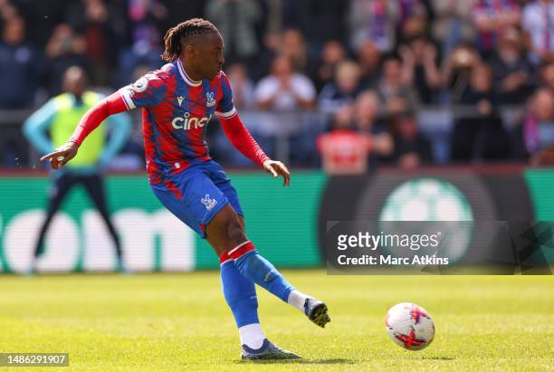 Eberechi Eze of Crystal Palace scores the team's fourth goal from a penalty kick during the Premier League match between Crystal Palace and West Ham...