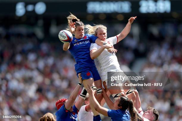 Alex Matthews of England and Gaelle Hermet of France challenge for a line out during the TikTok Women's Six Nations match between England and France...