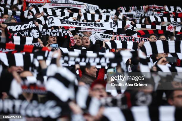 Eintracht Frankfurt fans hold their scarfs aloft prior to the Bundesliga match between Eintracht Frankfurt and FC Augsburg at Deutsche Bank Park on...