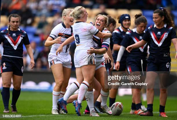 Shona Hoyle of England scores a first half tryduring the Mid-Season Rugby League International between England and France at The Halliwell Jones...
