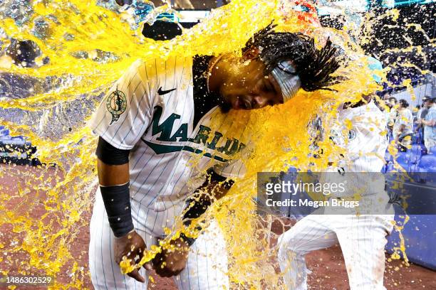 Jean Segura of the Miami Marlins is dunked with gatorade after defeating the Chicago Cubs at loanDepot park on April 28, 2023 in Miami, Florida.