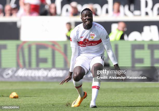 Silas Katompa Mvumpa of VfB Stuttgart reacts after losing a shoe during the Bundesliga match between VfB Stuttgart and Borussia Mönchengladbach at...