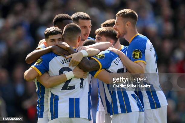 Deniz Undav of Brighton & Hove Albion celebrates with team mates after scoring their sides first goal during the Premier League match between...