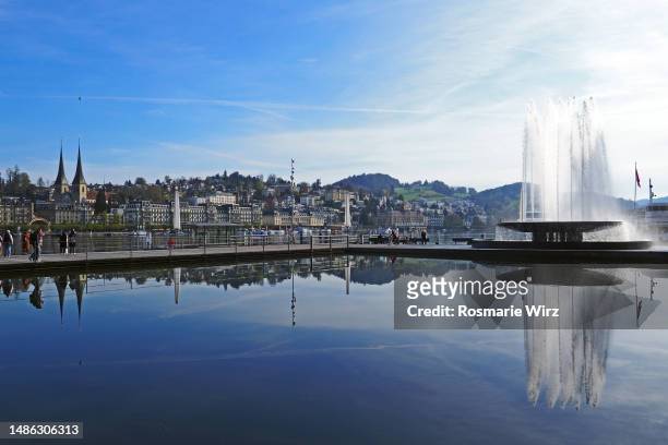 lucerne skyline with pond and fountain - skyline luzern stock pictures, royalty-free photos & images