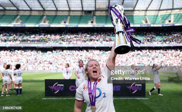 Marlie Packer of England celebrates with the TikTok Women's Six Nations trophy following the TikTok Women's Six Nations match between England and...
