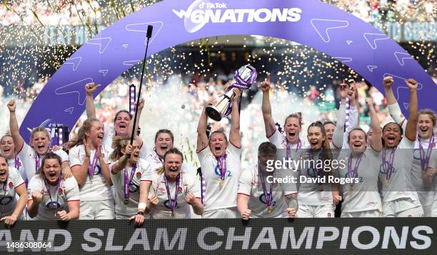Marlie Packer of England lifts the TikTok Women's Six Nations trophy following the TikTok Women's Six Nations match between England and France at...