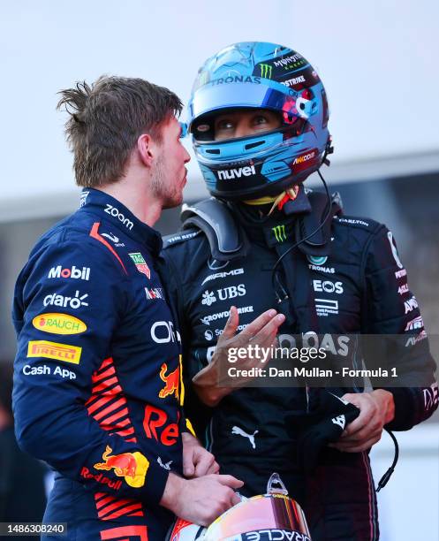 Third placed Max Verstappen of the Netherlands and Oracle Red Bull Racing and 4th placed George Russell of Great Britain and Mercedes talk in parc...